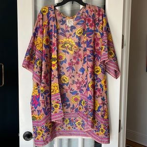 Billabong cover up. Great flower pattern. Size M. Fits size 6.